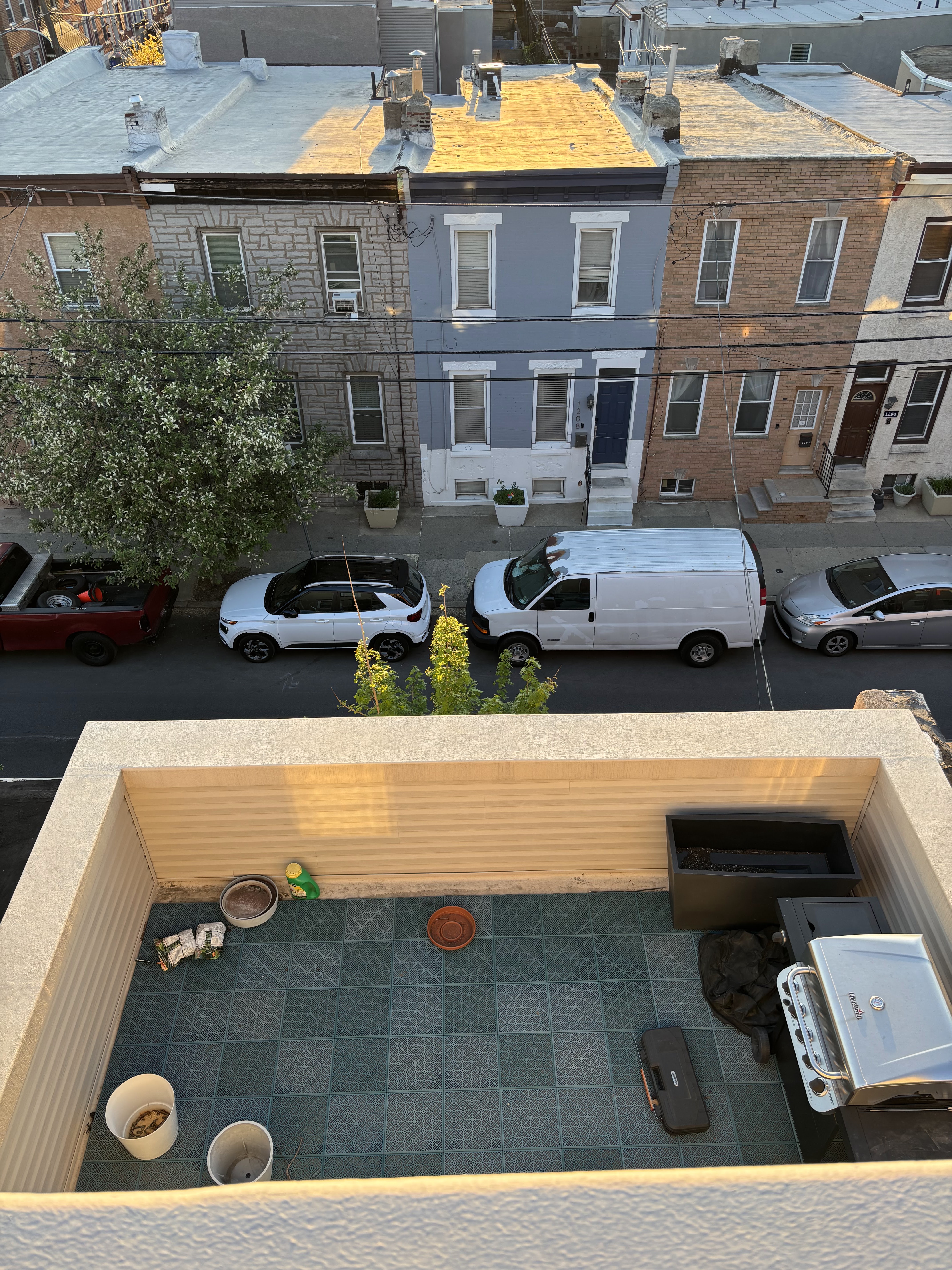 View from third floor deck looking down at patio