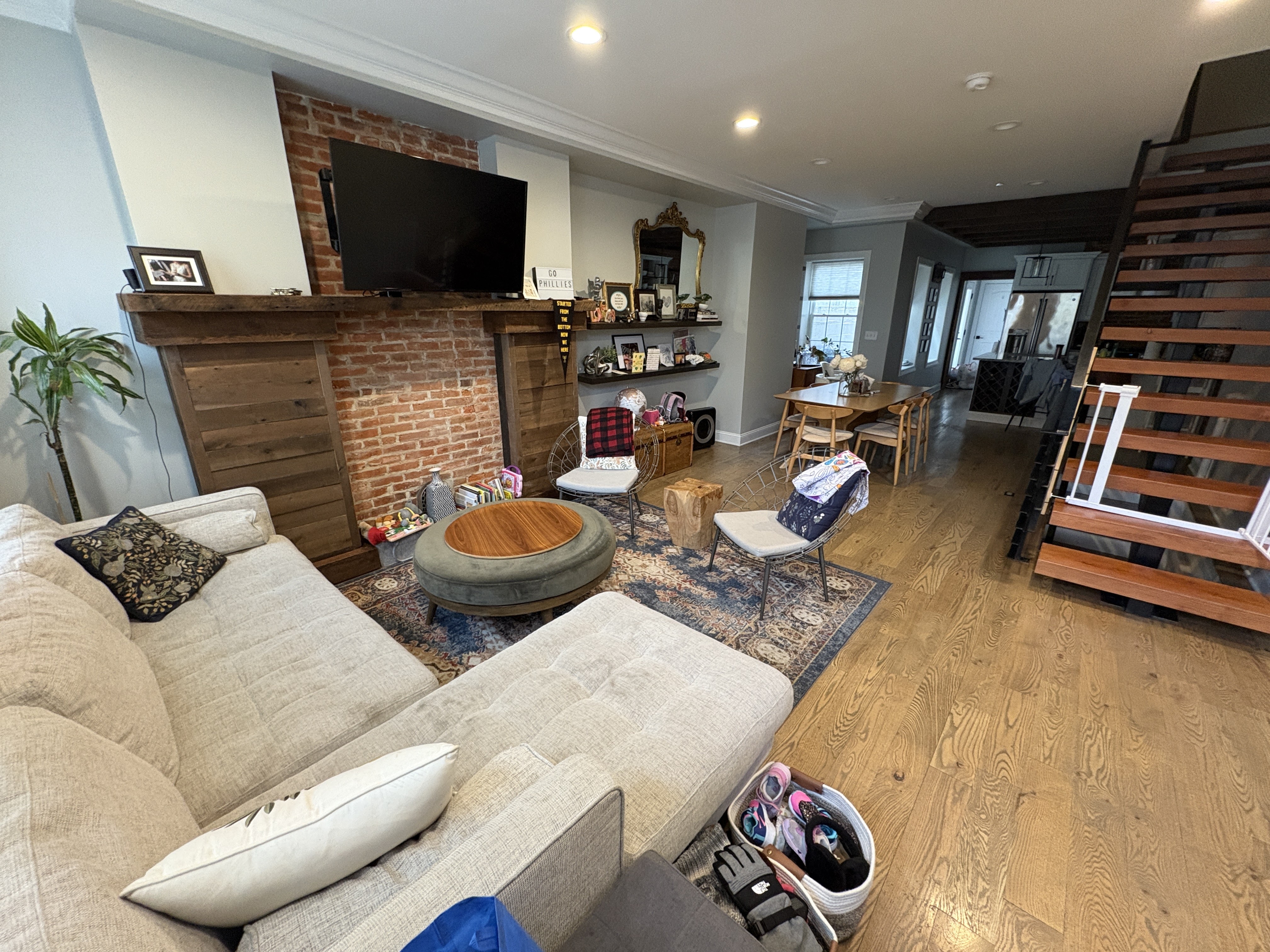 Living room with brick fireplace
